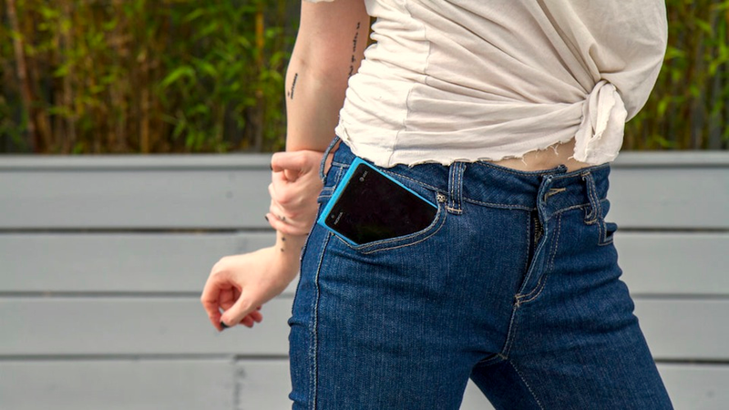 Illustration for article titled Giant Smartphones in Skinny Jeans: A Photoshoot